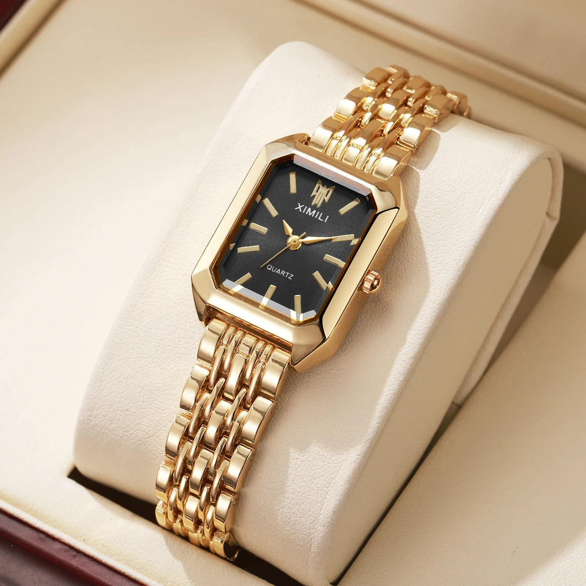Montre femme rectangulaire dorée cadran noir sans boîte