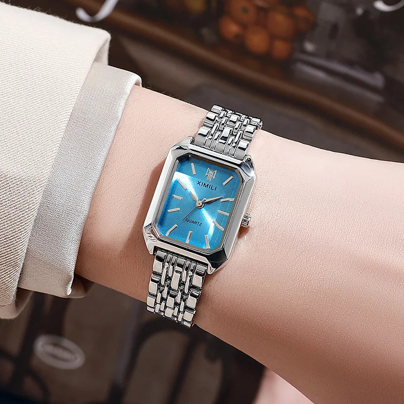 Montre femme rectangulaire argentée cadran bleu