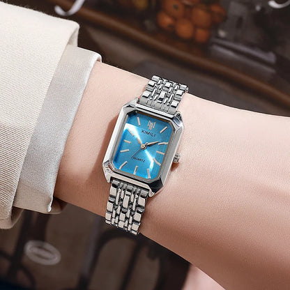Montre femme rectangulaire argentée cadran bleu
