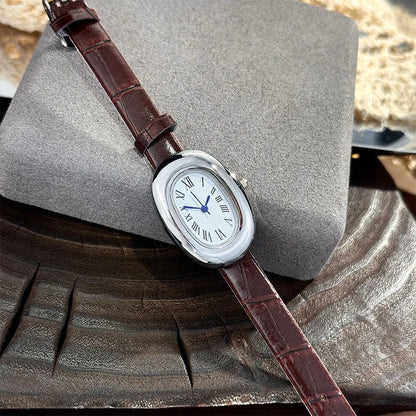 Montre femme ovale vintage argentée bracelet marron