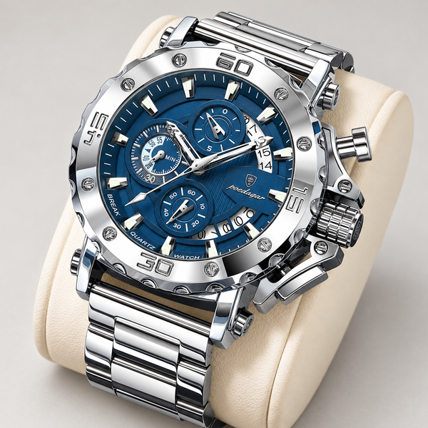 Montre Homme Chronographe en Acier – Argentée, cadran bleu, sur coussin clair.